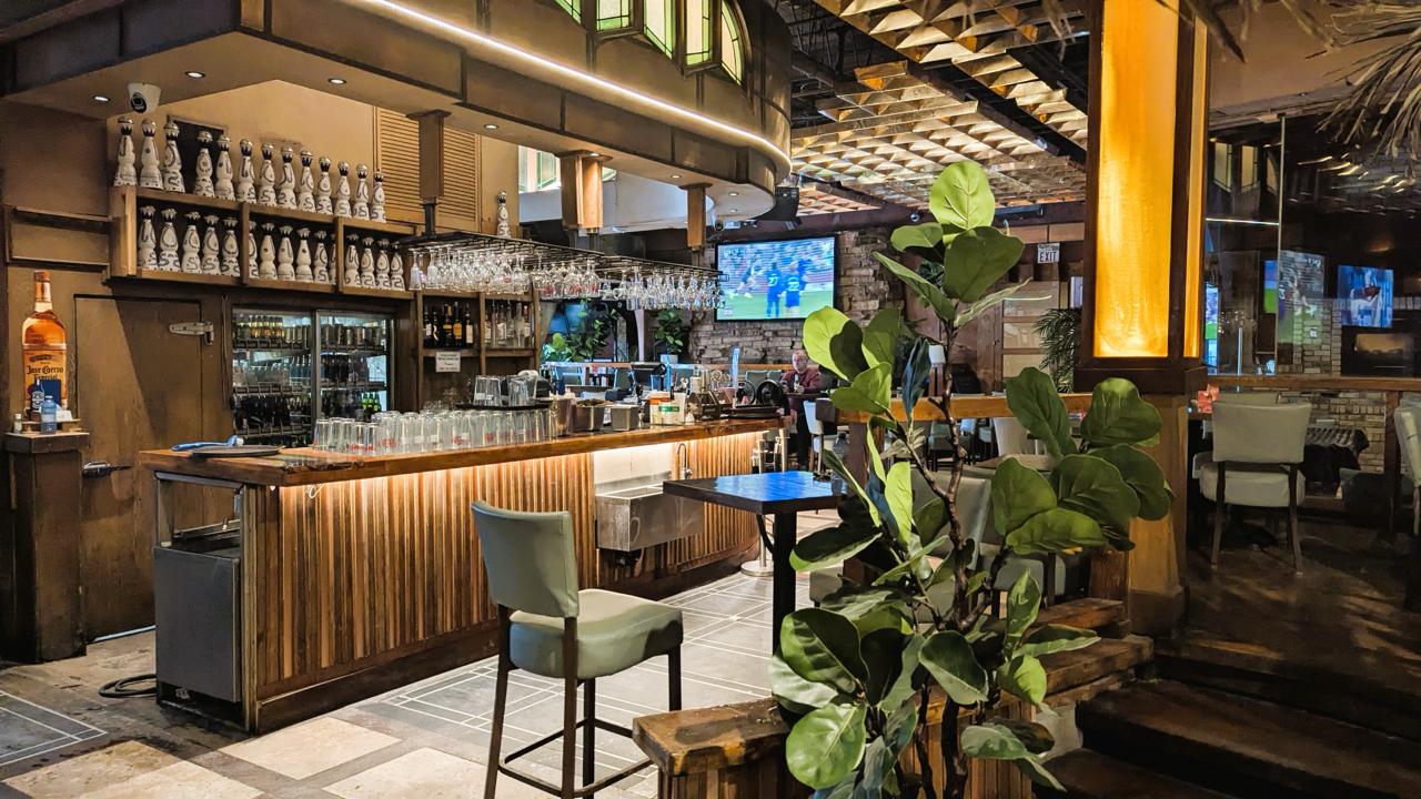 Bar seating and lounge chairs at Arizona Grill Lounge, ready for a group night out