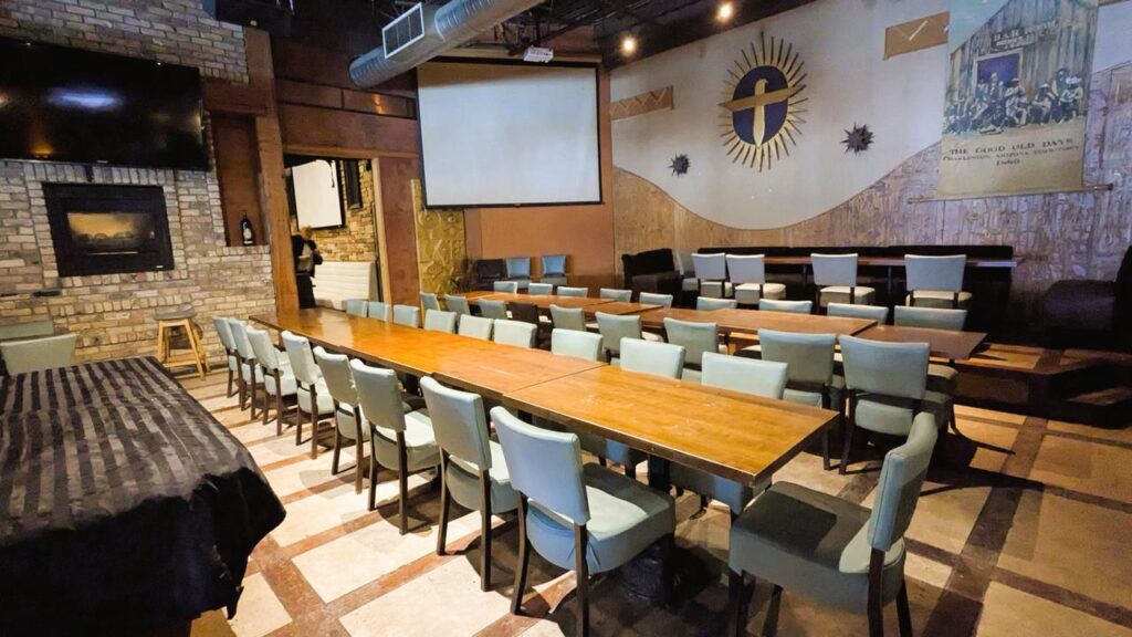 Long dining table set for a group in a private room at Arizona Grill Lounge in Etobicoke
